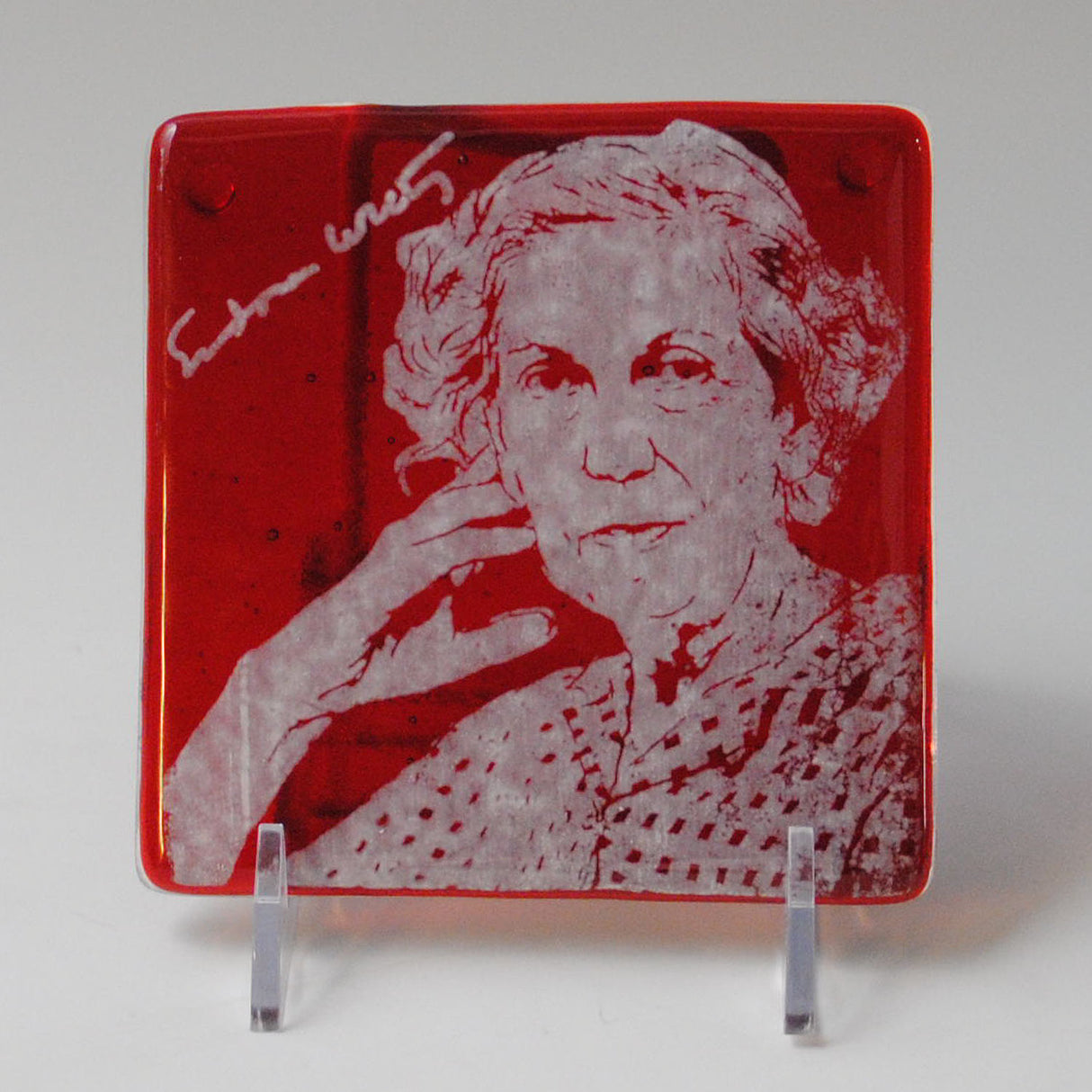 a red and white picture of a woman