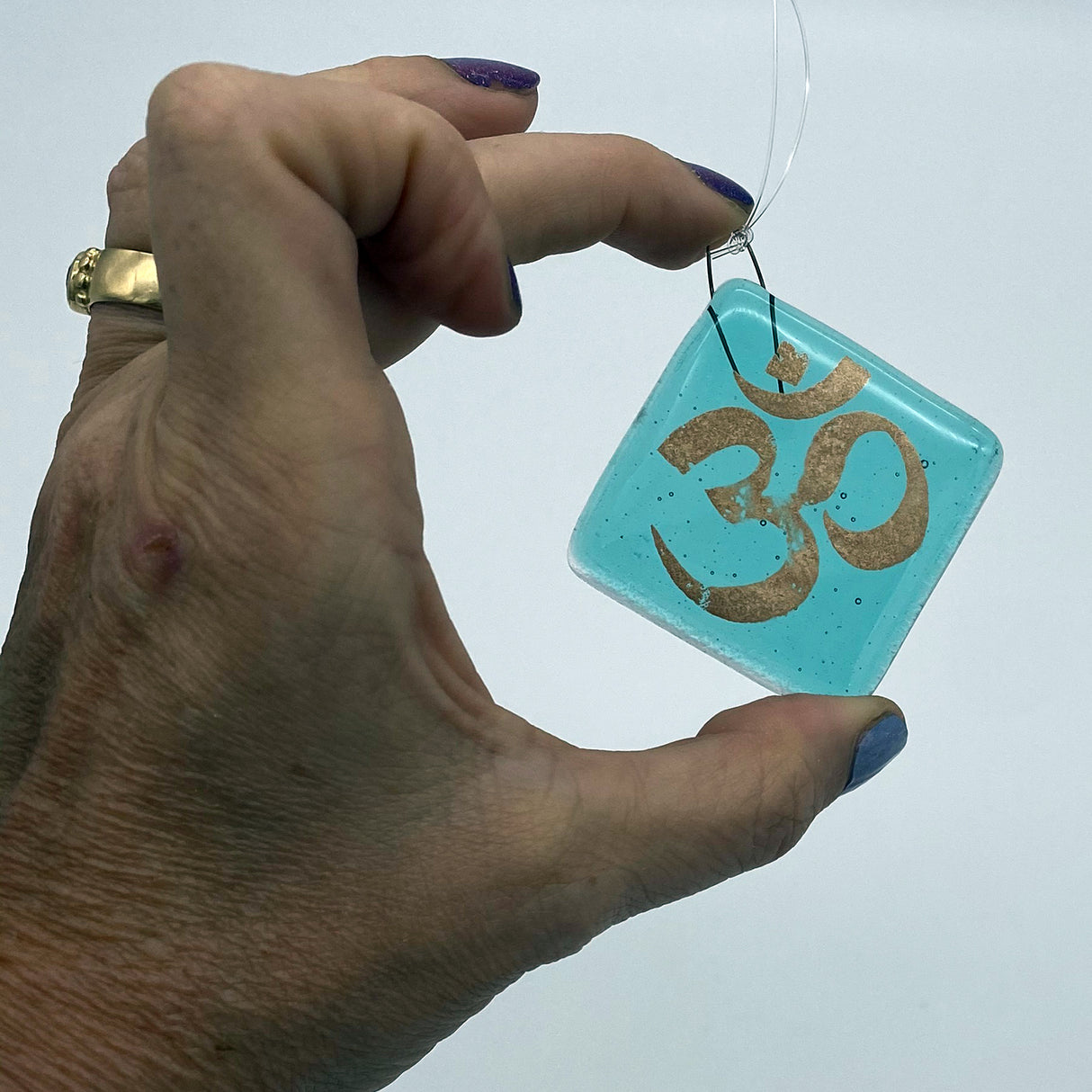 Om Single Sun Catcher