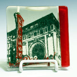 a picture of a building with a red and white handle
